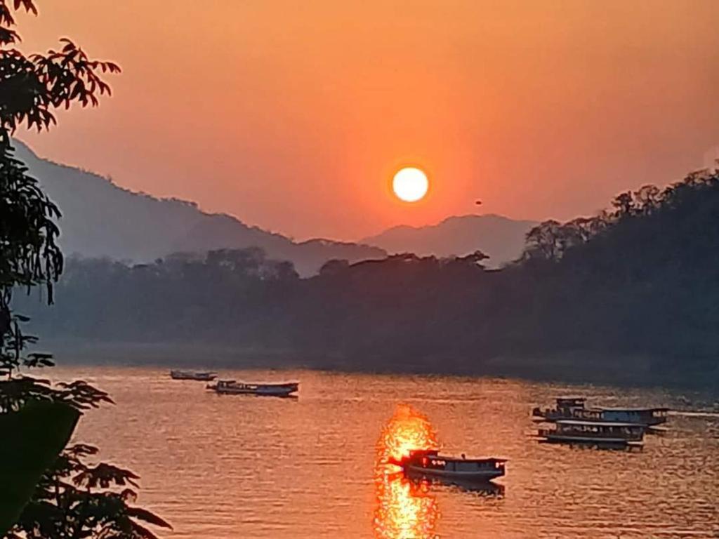 Sunset over the Mekong River at Luang Prabang, Laos.