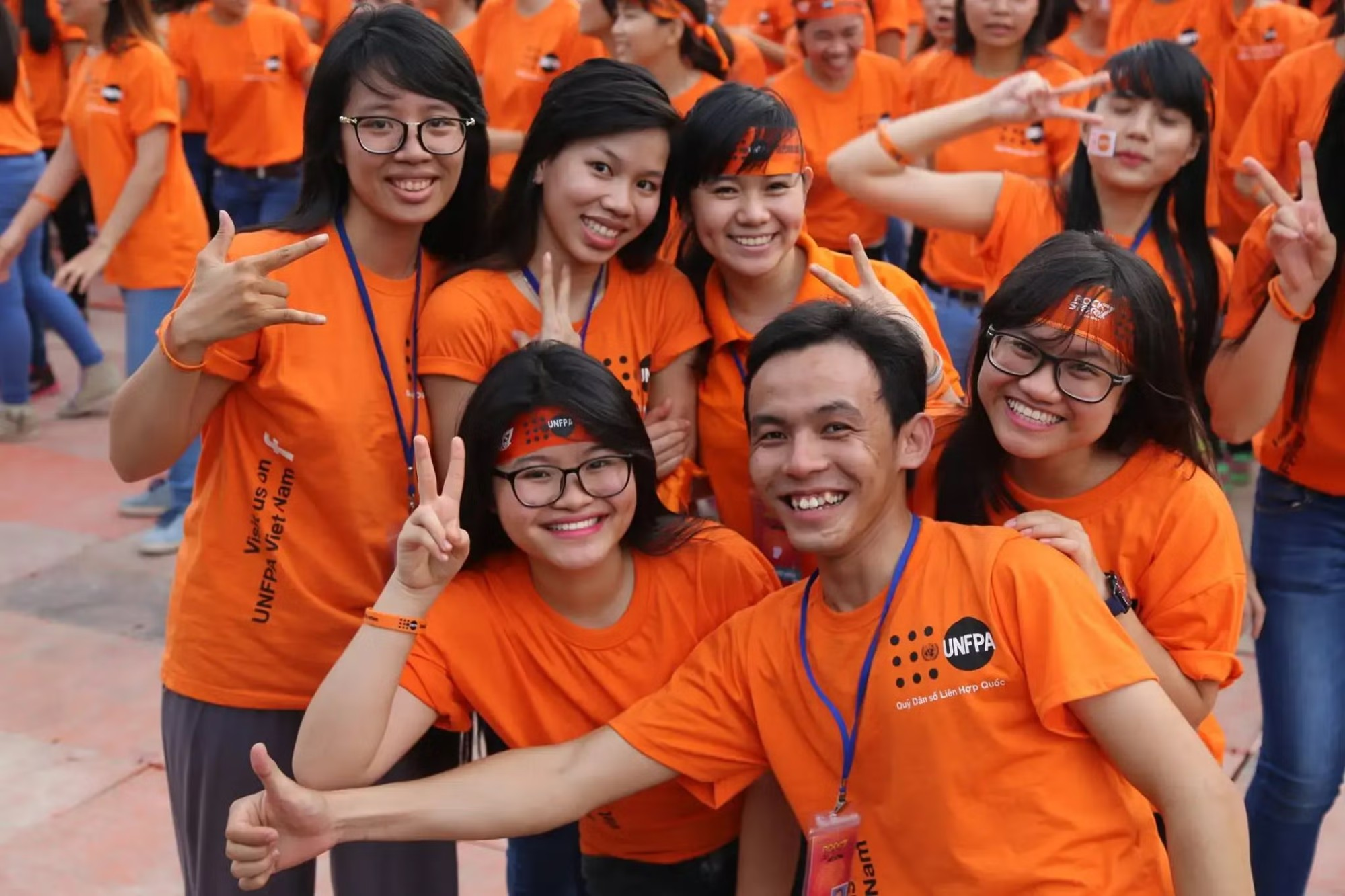 Young volunteers in Vietnam at a community outreach event.